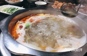 Sour Radish Duck Foot Soup in Small Pot