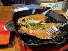 傣族香茅草烤罗非鱼-雀舞云南菜(天津天河城购物中心店)