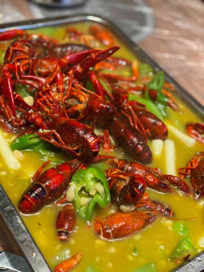 阿木龙虾(安波路店)-"阿木不会错总店排队人太多 而且隔壁的烧.