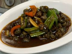 美味炒石螺-天宝食坊·啫啫煲大排档(西华路店)