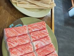 招牌生吃蟹肉-东镇老火锅(长春路首店)