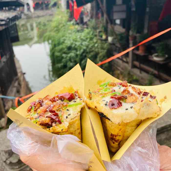 玲阿娘美食-"来新市古镇前朋友就说.这家玲阿娘梅花糕在.