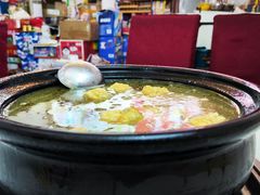 -正宗镇雄酸汤猪脚妙可火锅店