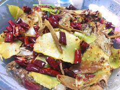 爆辣干锅鸭头-安诚居干锅鸭头(八角店)