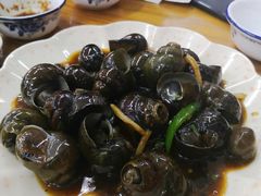 紫苏酸笋鼓汁炒田螺-南记食粥坊·宵夜大排档(南桂店)