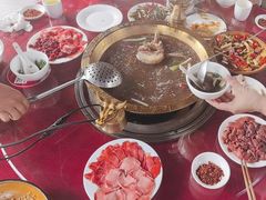 -周老三跷脚牛肉·全牛火锅(非遗传承店)