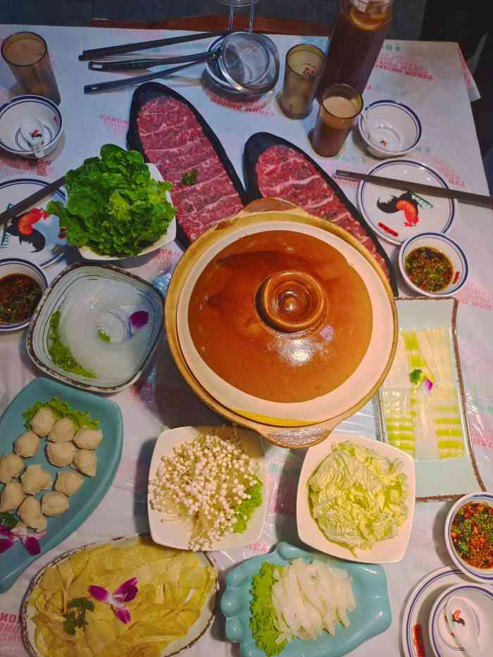 围炉捞金(天龙家园店)-"位于东中街的一家非常火爆的火锅店.停车不.