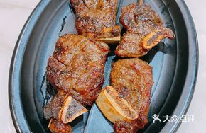 Signature Charcoal-Grilled Rib Tips