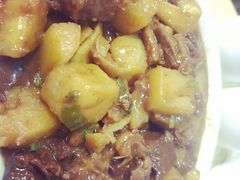 土豆烧牛腩-华春餐馆(鱼山路店)