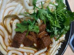 -明何记涮牛肚(品牌首店隋唐植物园南门古城路店)