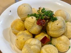 酸菜炒汤圆-蜗牛小馆醉乡民谣云南菜(惠新西里店)