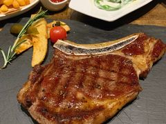 纽西兰珍藏级草饲战斧牛扒-喜洲吧·江畔老船厂·庭院餐厅(喜临院店)
