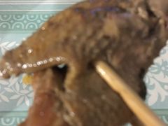 -梁老三麻辣鸡头总店