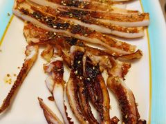 烤鱿鱼小串-街角等你.大连海鲜烧烤.经典铁板海鲜串(西安路店)