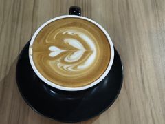 咖啡拿铁-百年朱苦拉咖啡(博物馆店)
