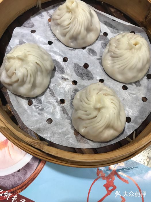 穿蒸引鲜·嗲记(正大广场店)双拼小笼（蟹粉+鲜肉）图片