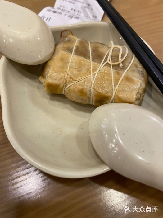 佬钱湾仔(衣裳街店)图片