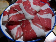 -喜悦小串丹东小黄牛海鲜烧烤大排档(民主广场店)