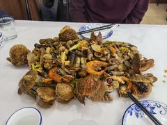 手抓海鲜-1910老鲁味海鲜·戳子肉·青岛菜(金沙滩店)