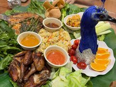 -沐毫傣泐云南菜孔雀宴•手抓饭傣味烧烤(曼听公园店)