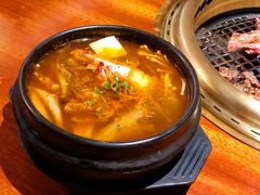 辣白菜海鲜豆腐汤-肉魁屋·烧肉·烧鸟·酒场(高新店)
