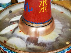 -毛辣果·贵州红酸汤牛肉火锅(西单店)