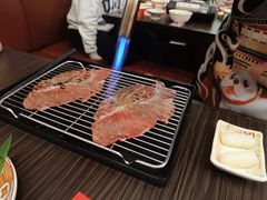 铺天盖地火牛寿司（2枚）-仙隐小鹿中华料理(南宁万象城店)