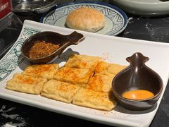 黄金爆浆豆腐-云海肴云南菜·蒸汽石锅鱼(青岛万象城店)