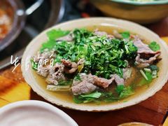 碗碗嫩牛肉翘脚-大众跷脚牛肉馆·非遗传承单位(峨眉山店)