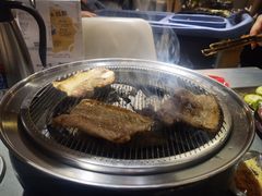 -围炉肉舍•炭烤活鳗•丹东海鲜烤肉(步行街店)