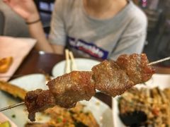 烤新疆羊腿肉串-大院涮烤·东北经典老味烧烤·铜锅涮肉(江南东路店)