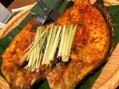 香茅草烤罗非鱼-云海肴·汽锅鸡·云南代表菜(天山百盛优客店)