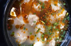 Sour Snail Pork Dumplings