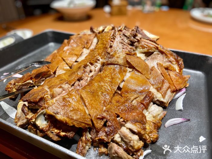 九十九顶毡房(清河店)蒙古烤羊背图片