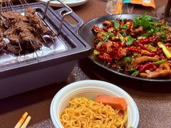 -曼听小寨海鲜烧烤·大连辣炒大王(盖州街店)