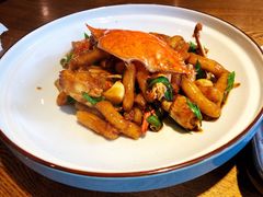 梭子蟹炒年糕-杭百味·大众精选杭帮菜(西湖音乐喷泉店)