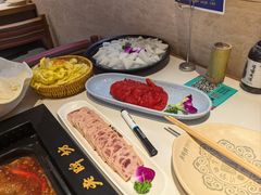 -老牌坊云南鱼豆花火锅(哈西万达店)