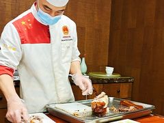 老北京烤鸭片皮现场-和记小菜(七宝店)