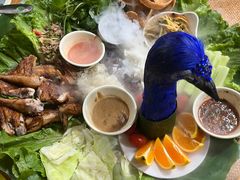 -沐毫傣泐云南菜孔雀宴•手抓饭傣味烧烤(曼听公园店)