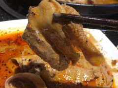 -明何记涮牛肚(品牌首店隋唐植物园南门古城路店)