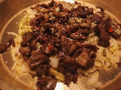 酸菜炒羊肉-丝路金桃·新疆菜(徐汇店)