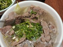 奔跑牛肉汤-犇逸·乐山跷脚牛肉·四川现炒(览海店)