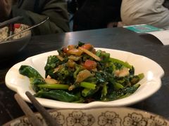 酸腌菜炒豌豆尖-火燒雲傣家菜(鼓楼店)