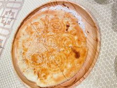 馕坑芝麻馕-巴扎美食·新疆菜·西域歌舞表演餐厅(新疆大厦店)