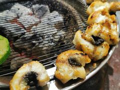 招牌活烤鳗鱼-围炉肉舍•炭烤活鳗•丹东海鲜烤肉(步行街店)