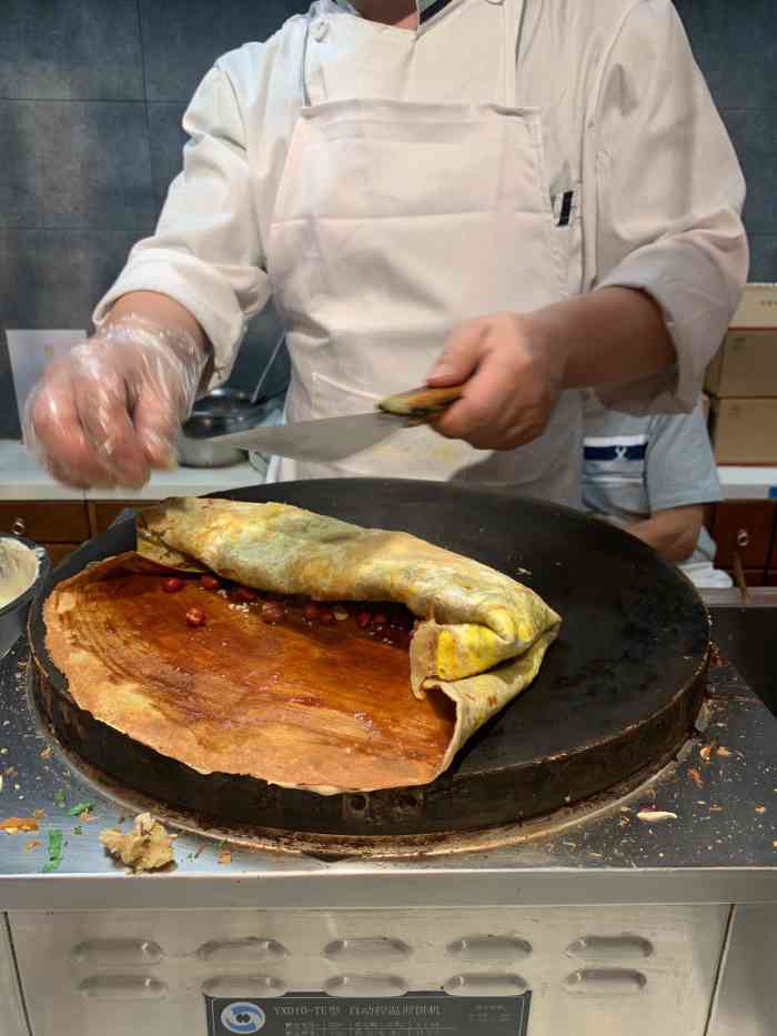 白毛煎饼王-"朋友一早给我打包过来,经过了半个多小时后.