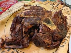 特色熏骨-闯关东东北农家菜(崂山石老人店)