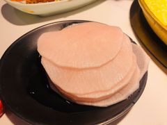 腌萝卜片-猪啊牛呀羊啊铜盘烤肉(正大广场店)