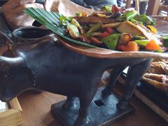 包烧野生牛肝菌-云海肴·汽锅鸡·云南代表菜(天山百盛优客店)