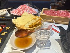 -老牌坊云南鱼豆花火锅(哈西万达店)